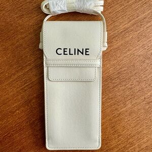 White leather Celine case with strap